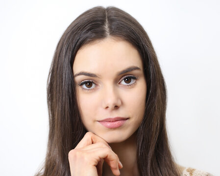 Portrait Of Beautiful Brunette Young Woman With Brown Eyes Isolated On White Background Close Up