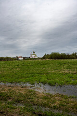 cityscape of the old center of the city of Suzdal with churches and temples after the rain
