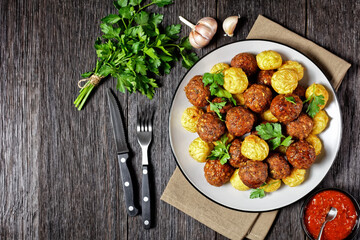 Italian meatballs and pasta balls on a plate