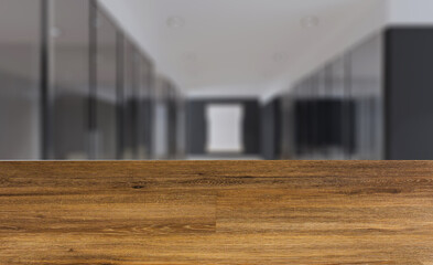 concept of modern office interior. bent forms. walls of wood. big windows. 3D rendering.. Abstract blur phototography. wooden table on blurred background.