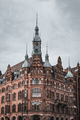 Fototapeta na wymiar the Speicherstadt in hamburg photographed in broad daylight with dramatic colors and slightly desaturated