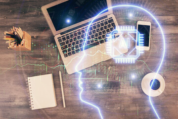 Multi exposure of brain sketch hologram over topview work table background with computer. Concept...
