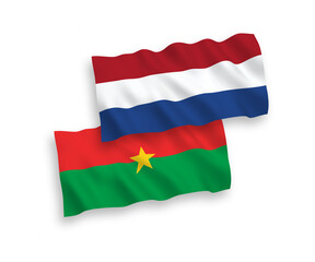 Flags of Burkina Faso and Netherlands on a white background