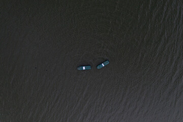 Fishing boats, floating the calm waters and going for fishing