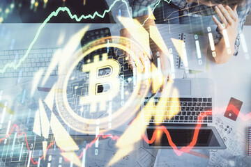 Double exposure of man and woman working together and crypto theme hologram drawing. Computer background. Blockchain concept. Top View.