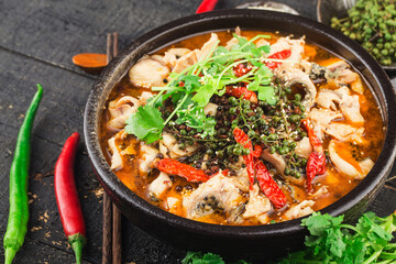 Obraz na płótnie Canvas A Chinese delicacy: boiled fish