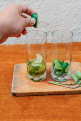 Fototapeta premium Preparing a delicious mojito at home