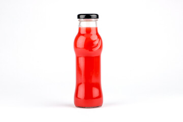 Glass fruit juice bottle isolated on white background.