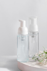 Fototapeta na wymiar Transparent plastic cosmetic foam pump bottle mock-up.
