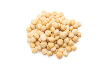 Macadamia nuts isolated on white background.