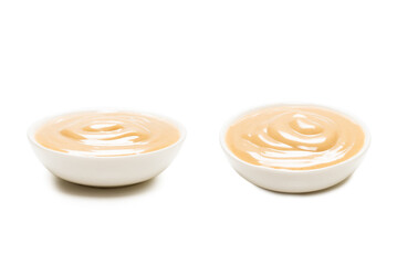 Mushroom sauce in a bowl isolated on white background.