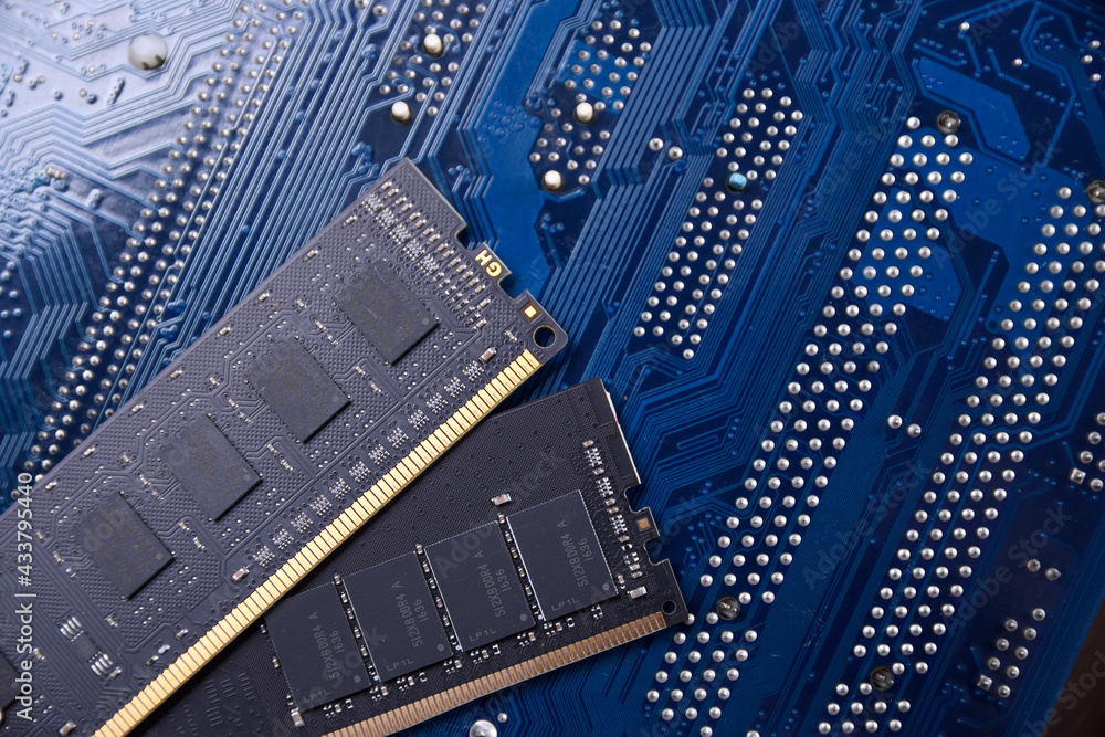 Poster Computer memory RAM on motherboard background . Close up. system, main memory, random access memory, onboard, computer detail. Computer components . DDR3. DDR4. DDR5