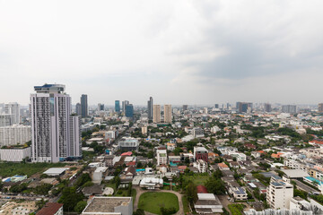 Fototapeta premium BANGKOK,THAILAND-APRIL 22, 2021: The cityscape view at Sukumvit road area which is the main business and shopping area at Ekkamai view point on APRIL 22, 2021 in Bangkok,Thailand