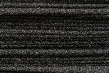 Black carpet for sale. Carpets placed on top of each other
