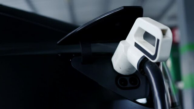 Electric car charger. Automotive technology of the future. Save energy And protect the environment. 