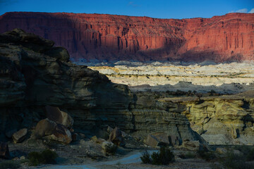 A road snaking through the colorful landscape of Ischigualasto Provincial Park, San Juan Province, Argentina