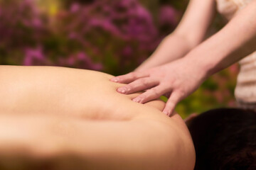 hands of a professional masseuse while working close-up