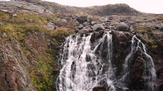 Waterfall shooting from bottom to top