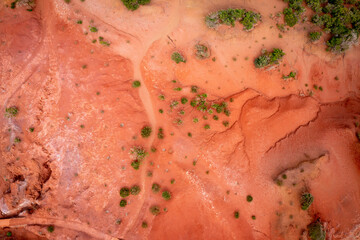 La Gomera, Canary Islands - Aerial view of erosion landscape with red soil on the north coast above Agulo with a view to Tenerife.