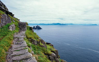 Fototapeta na wymiar Skellig islands, Skellig Michael is a twin-pinnacled crag 11.6 kilometres west of the Iveragh Peninsula in County Kerry, Ireland.