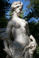 Fototapeta na wymiar Statue of Aurora by Giovanni Bonazza. Sculpture of the Summer Garden in St. Petersburg.