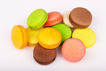 Colorful macarons isolated on white background.