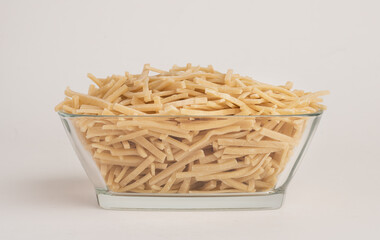 Handmade Turkish Noodles (Turkish Name: Eriste) in glass bowl. Erishte from Traditional Turkish Cuisine.