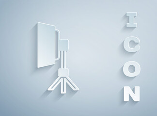 Paper cut Studio light bulb in softbox icon isolated on grey background. Shadow reflection design. Paper art style. Vector