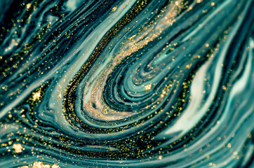 Abstract ocean- ART. Natural Luxury. Style incorporates the swirls of marble or the ripples of agate. Very beautiful blue paint with the addition of gold powder.