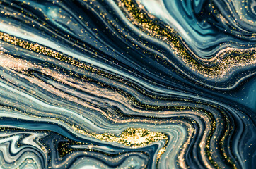 Abstract ocean- ART. Natural Luxury. Style incorporates the swirls of marble or the ripples of agate. Very beautiful blue paint with the addition of gold powder.