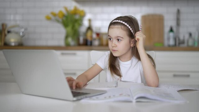 Girl using laptop during online studies