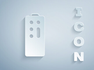 Paper cut Remote control icon isolated on grey background. Paper art style. Vector