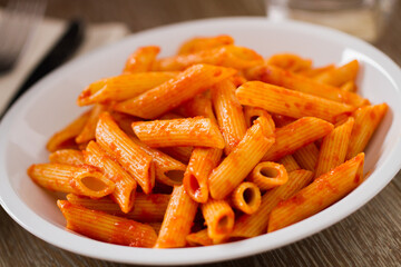Pasta with Tomato Sauce on a plate. High quality photo.