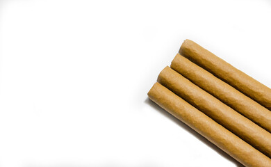 Cigars on a white background, soft focus image.
