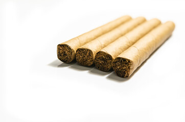 Cigars on a white background, soft focus image.