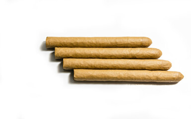 Cigars on a white background, soft focus image.