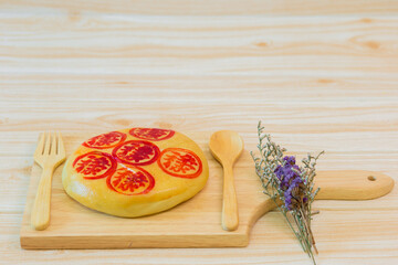 Delicious Chinese traditional cake, cake Chinese Characters on Dim Sum . Chinese Cake. traditional pastry Moon cake tray on wooden background.