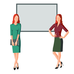 Two young business girls on the background of the chalkboard.