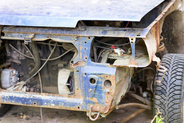 Old rusty car headlight