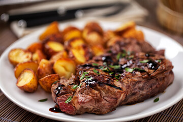 Grilled Beefsteak with Baby Roasted Potatoes. High quality photo.