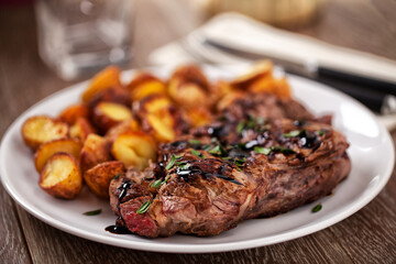 Grilled Beefsteak with Baby Roasted Potatoes. High quality photo.