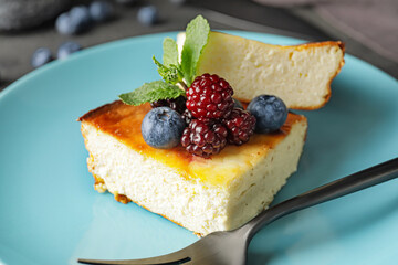 Pieces of tasty cottage cheese casserole on plate