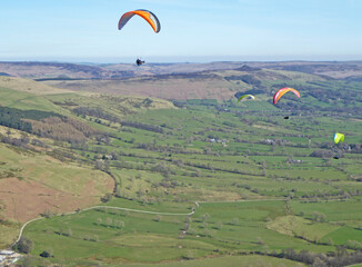 Paragliders in the Peak District Derbyshire from Mam Tor