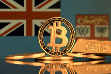 Physical version of Bitcoin, gold bar and Fiji Flag.