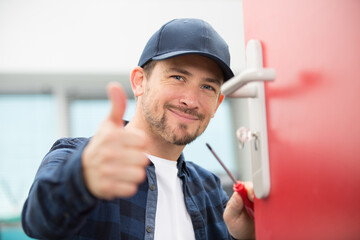 man showing thumb up in camera