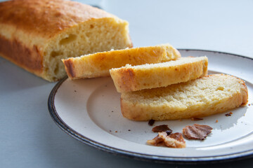 sliced simple  home made yogourt cake , home cooking .
