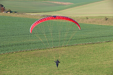 Paraglider flying at Milk Hill, Wiltshire	