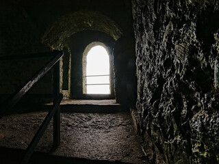 window in old fortified Hell Fire club hunting lodge in Dublin, Ireland , view from inside with...