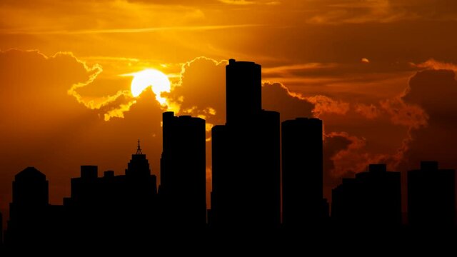 Detroit Skyline: Time Lapse at Sunset with Red Sun and Fiery Sky, Michigan, USA