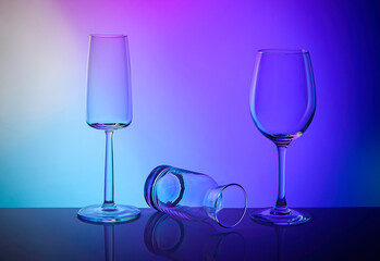 Glassware for alcoholic beverages, on a colorful background